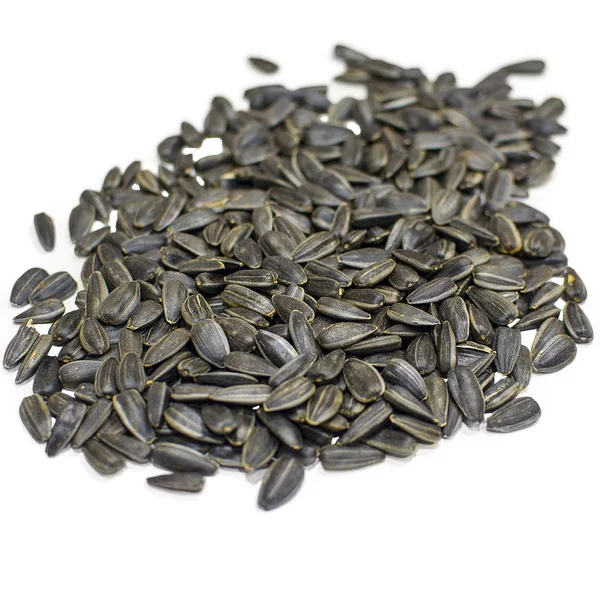 Torrado sementes de girassol isolado no fundo branco — Fotografia de Stock