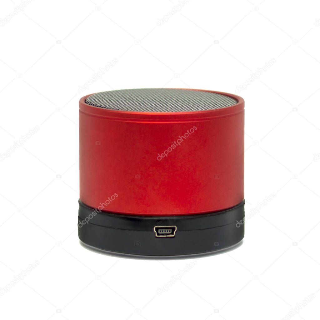 Red, portable subwoofer. Isolated subject on white background. Object for projects and design. Conception portable audio system.