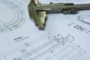 Yakın plan mühendislik çizimi ve kalibre. Teknik arkaplanı kavra.