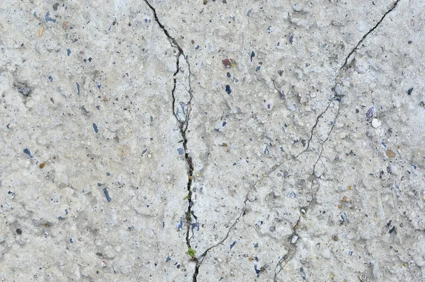 裂缝的水泥墙纹理背景。裂缝混凝土背景. — 图库照片