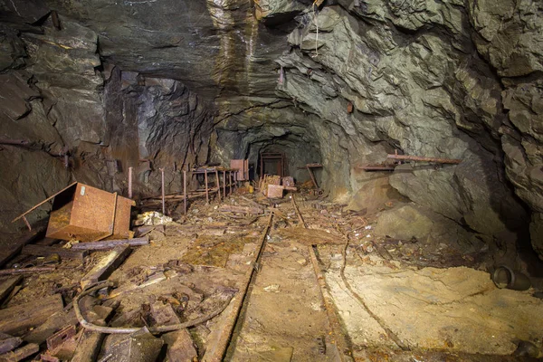 Gold mine ore shaft tunnel drift with rails underground