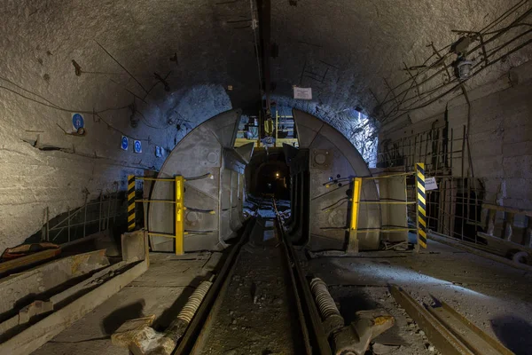 Gold ore mine underground tunnel with rotary wagon dumper tipper