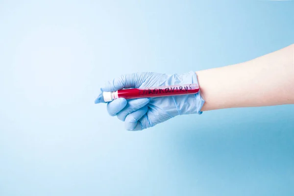 Hand Blue Medical Disposable Rubber Gloves Holds Test Tube Red — Stock Photo, Image