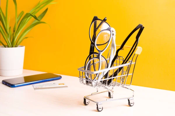 Several Pairs Different Glasses Vision Correction Small Shopping Cart Table — Stock Photo, Image