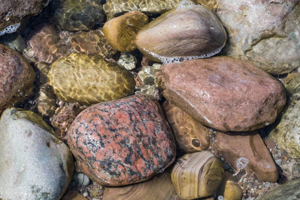 Fundo de pedras molhadas — Fotografia de Stock