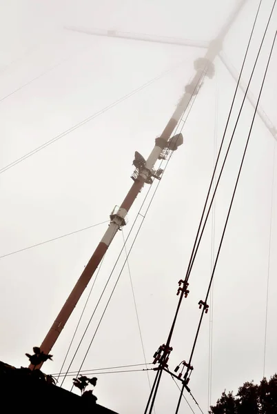 Antenna repeater in fog — Stock Photo, Image