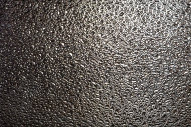 Soyut bir arkaplan ve duvar kağıdı olarak kullanmak için cam yüzey dokusu.