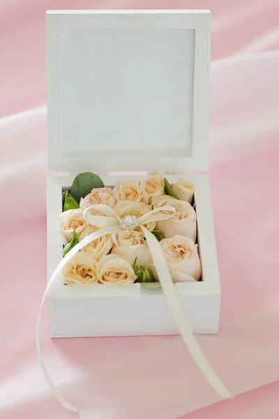 Wedding gift casket decorated with bow and buds