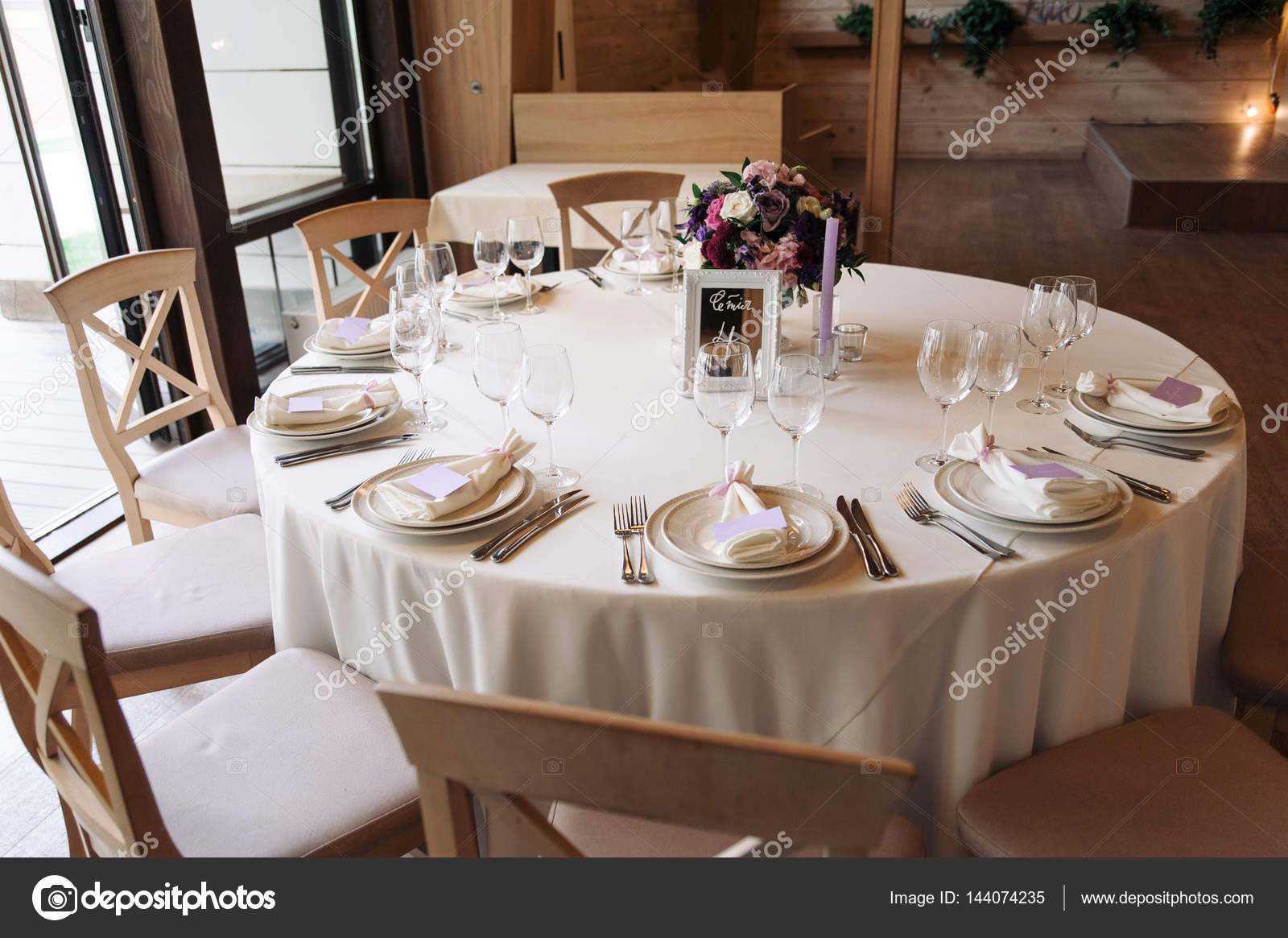 Wedding Table With Candles Flowers And Sign Number Stock