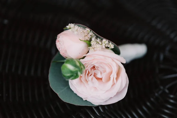 Beautiful boutonniere made from the light pink rose — Stock Photo, Image