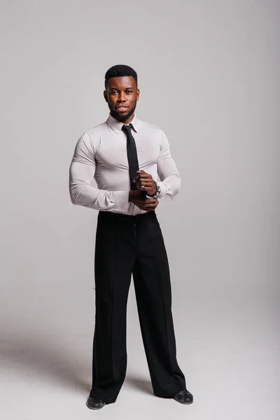 Happy confident young african american business male smiling with confidence, executive stylish company leader. Portrait of an businessman wearing suit and tie isolated on white background Royalty Free Stock Images