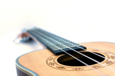 Brown ukulele hawaiian guitar isolated on white background