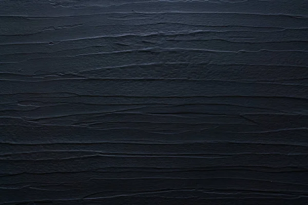 black background. Dark wallpaper blackboard. Flat lay top view copy space Grunge texture.