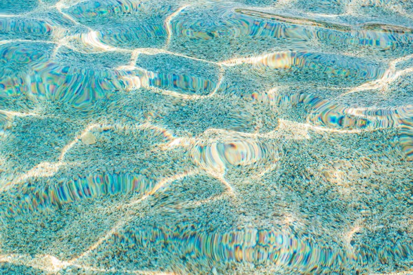 Abstract natuur water kiezels achtergrond. Blauwe steentjes textuur. Stenen achtergrond. Blauwe vintage kleur. Zee kiezelstrand. Prachtige natuur. Turkoois kleur — Stockfoto