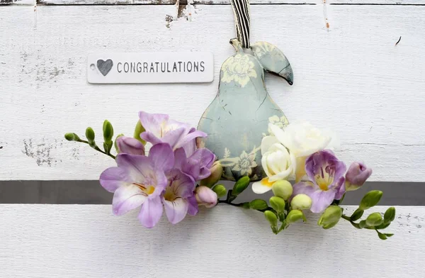 English Pear and Freesia with congratulations Stock Picture