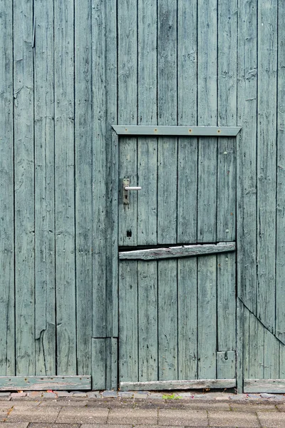 Puerta de granero holandés de madera pintada verde - vertical Imagen De Stock