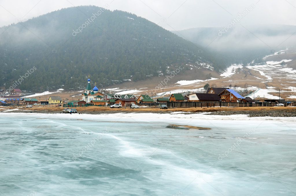 Big Goloustnaya Village. View from iced Baikal lake