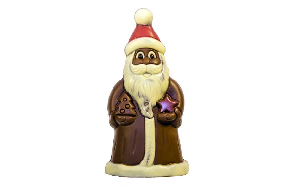 Chocolate Santa Claus in red cap. Sweet present Royalty Free Stock Photos