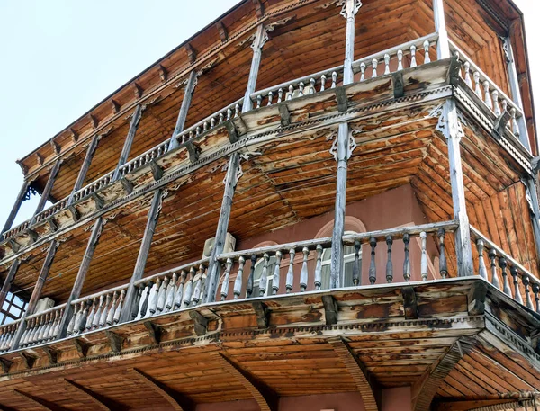 Traditional wooden carved balconies of residential building in center of Tbilisi — Stock Photo, Image