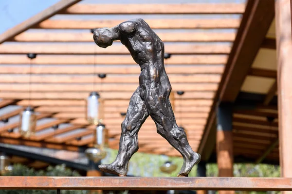 Yerevan, Armenia-April, 29 2019: Bent Walking Man, part of sculptural composition in Yerevan — Stock Photo, Image