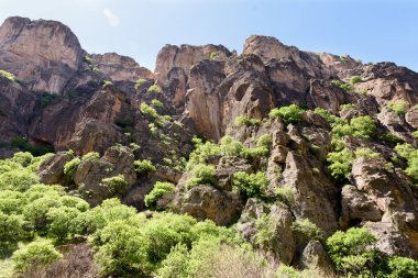 Rocky bank of Arpa River. Mountains of Armenian Highlands belong to Lesser Caucasus, Armenia