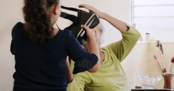 Virtual Reality With Happy Grandmother And Grandaughter Playing Smiling Laughing — Stock Video