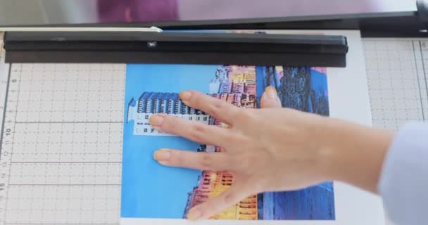 Photographer Cropping And Editing Digital Print For Photo Show — Stock Video