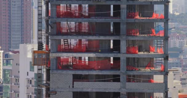 Construction Site With Lift Skyscraper Building Manual Workers — Stock Video