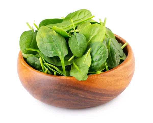 Spinach leafs in wooden bowl isolated on white background — Stock Photo, Image