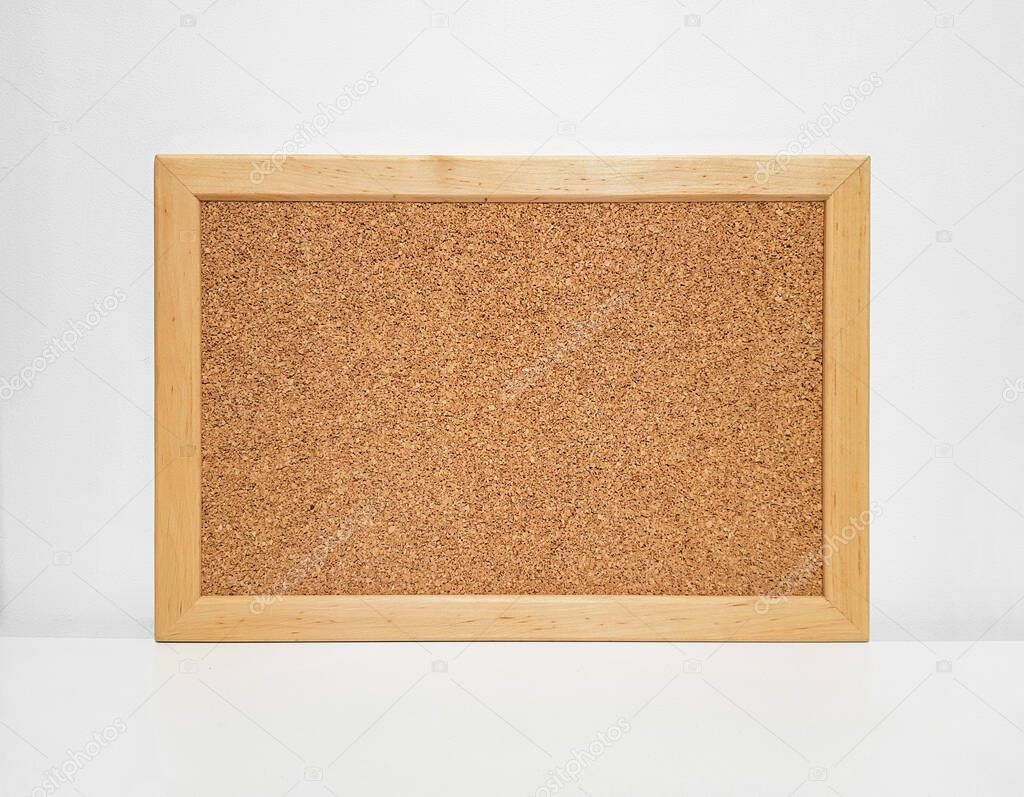frame for photos or notes with cork on a white background