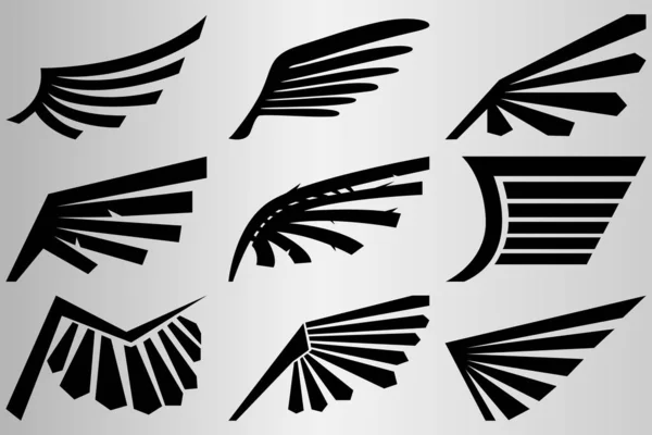 Zestaw różnych abstrakcyjnych skrzydeł. Sylwetka skrzydeł. Rysunek do tatuażu. — Wektor stockowy