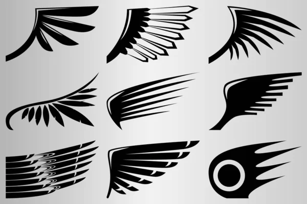 Set of different abstract wings. The silhouette of the wings. Drawing for tattoo. — 스톡 벡터