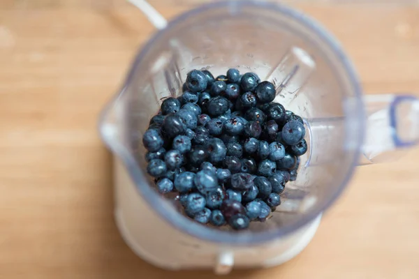 Ripe blueberry in blender — Stock Photo, Image