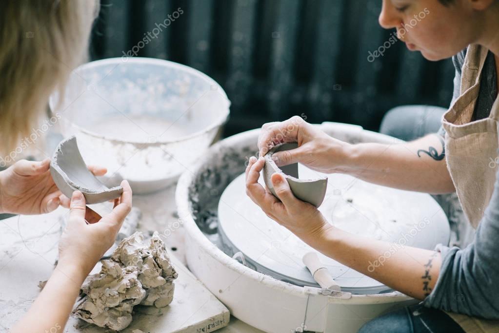 Woman Working At Pottery Studio