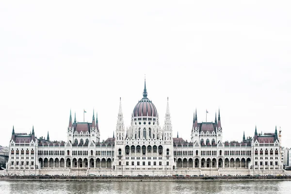 Famous place Hungarian parliament in Budapest in overcast morning rush hour, Hungary