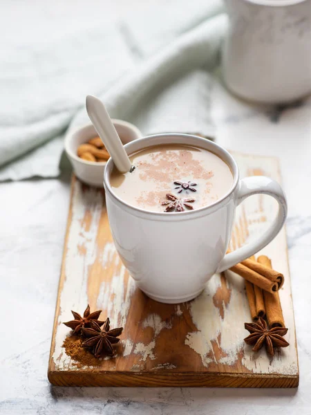 Tea with milk and spices — Stock Photo, Image
