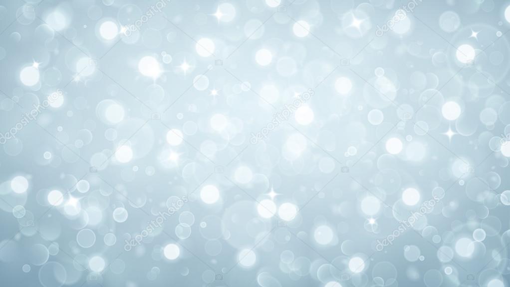 Abstract background with bokeh effect in light blue