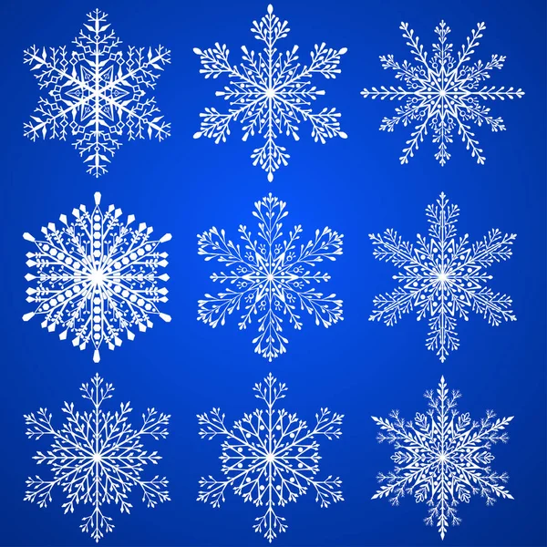 Conjunto de copos de nieve de Navidad — Vector de stock