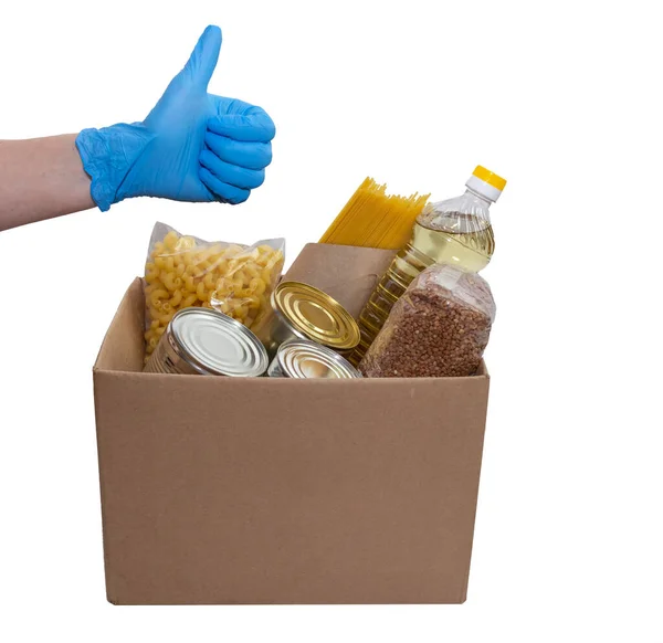 Various canned goods, pasta and cereals in a cardboard box, with meta for the logo. Food donations or food delivery concept. Isolated on white.