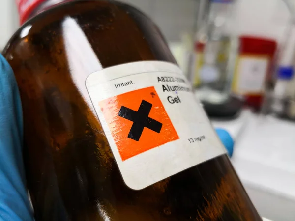 Irritating chemical with an X-shaped warning mark