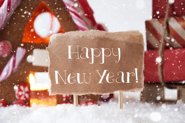 Casa di pan di zenzero con slitta, Fiocchi di neve, Testo felice anno nuovo — Foto Stock