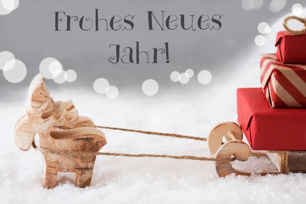 Олени с санями, серебристый фон, Neues Jahr означает Новый год — стоковое фото