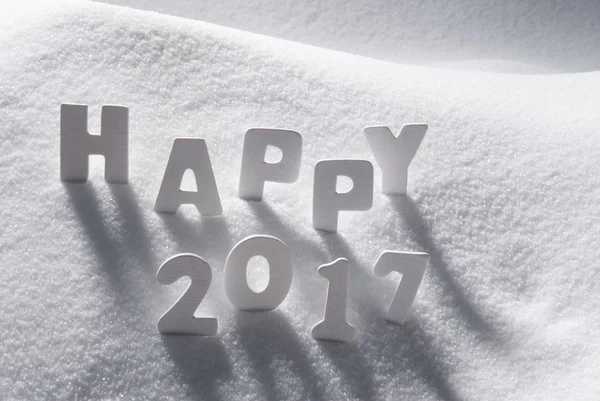 Text šťastný 2017 s bílými písmeny ve sněhu — Stock fotografie