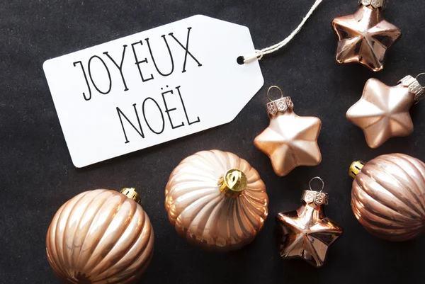 Bolas de árvore de bronze, Joyeux Noel significa Feliz Natal — Fotografia de Stock