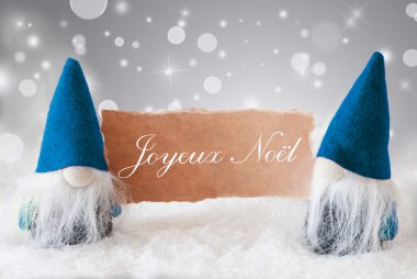Kart ile Mavi Gnomes, Joyeux Noel Mutlu Noeller anlamına gelir