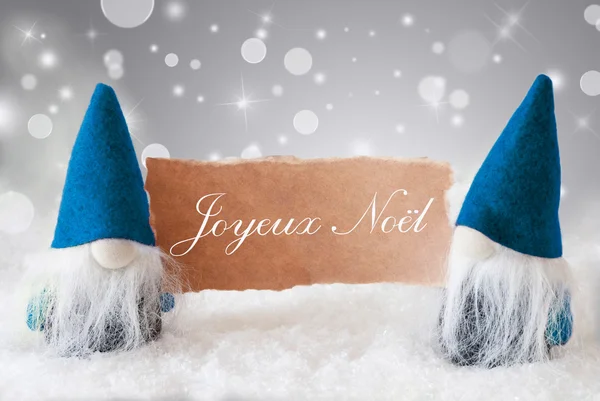 Gnomos azules con tarjeta, Joyeux Noel significa Feliz Navidad — Foto de Stock