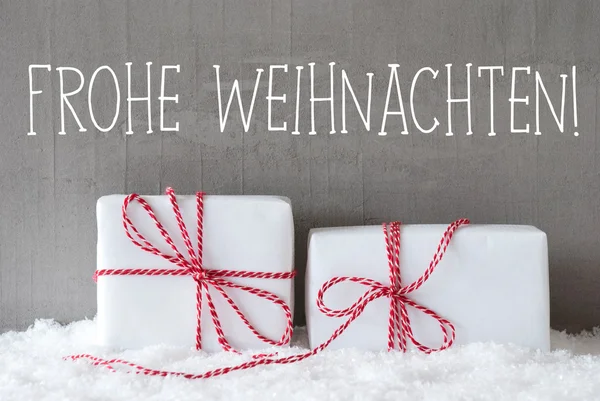 Due regali con neve, Frohe Weihnachten significa Buon Natale — Foto Stock