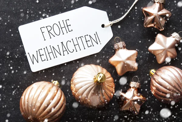 Brons bollar, snöflingor, Frohe Weihnachten betyder god jul — Stockfoto