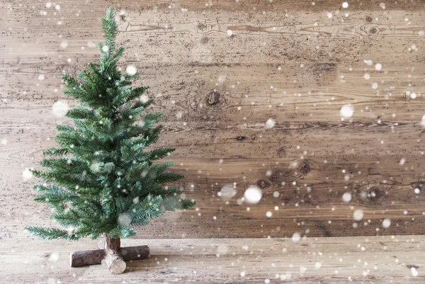 Kerstboom, oud houten achtergrond, kopie ruimte, sneeuwvlokken — Stockfoto