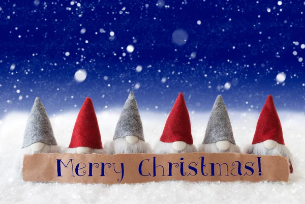 Гномы, синий фон, снежинки, текст С Рождеством Христовым — стоковое фото